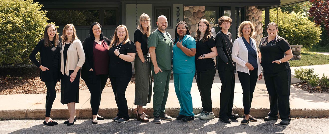 Staff at Omnivet posing in front of building