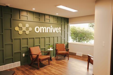 Comfortable and welcoming waiting area at Omnivet, a premier emergency and urgent care veterinary clinic in Traverse City. Designed for a relaxing experience for pet parents and their pets.